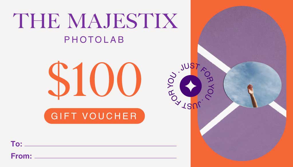 Template Elegant Purple and Orange Voucher Design Template