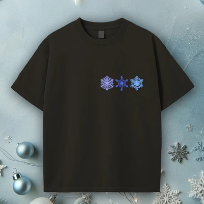 Template Chic Black T-Shirt Design with Blue Snowflakes